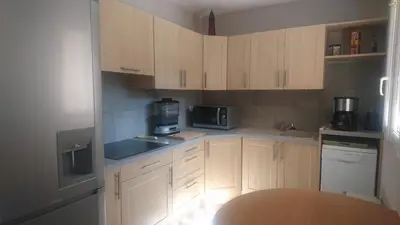 Cuisine ou kitchenette dans l'établissement Joli villa Marcel classée 3 étoiles