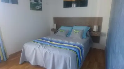 Un ou plusieurs lits dans un hébergement de l'établissement Joli villa Marcel classée 3 étoiles