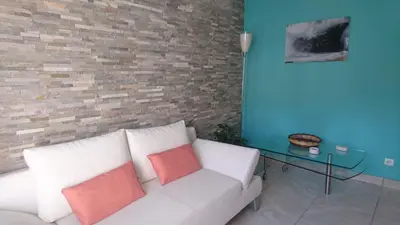 Coin salon dans l'établissement Joli villa Marcel classée 3 étoiles