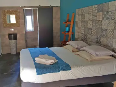 Un ou plusieurs lits dans un hébergement de l'établissement Hôtel Ascosa Aventure