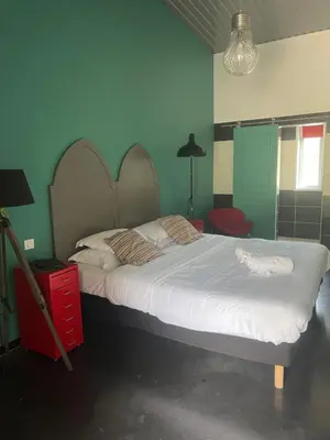 Un ou plusieurs lits dans un hébergement de l'établissement Hôtel Ascosa Aventure