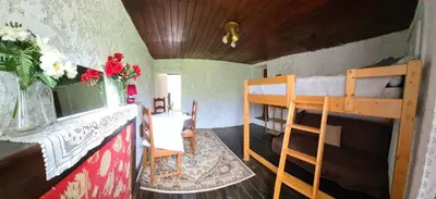 Un ou plusieurs lits dans un hébergement de l'établissement Maison de Vacances Renno