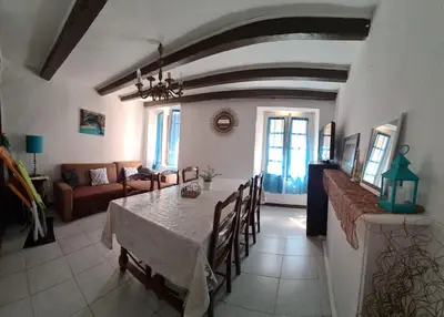 Coin salon dans l'établissement Maison de Vacances Renno