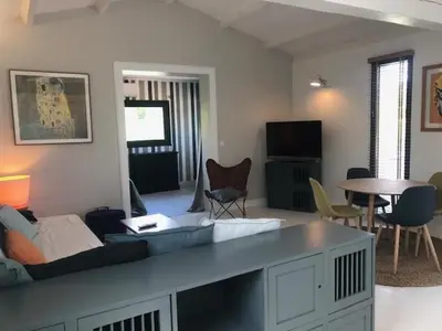 Télévision ou salle de divertissement dans l'établissement Oliera 2