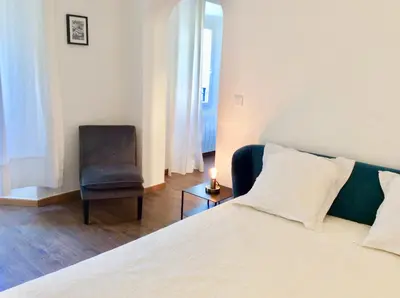 Un ou plusieurs lits dans un hébergement de l'établissement Appartement Doria