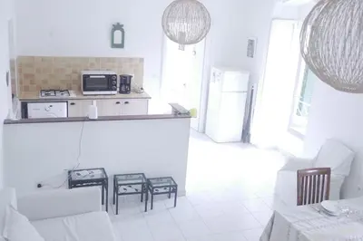 Cuisine ou kitchenette dans l'établissement Casa Eugénie l'appartement de tante Madeleine vue sur les montagnes