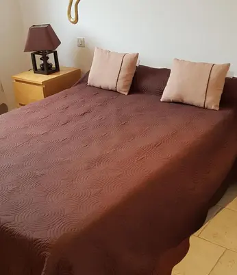 Un ou plusieurs lits dans un hébergement de l'établissement Villa A funtanella