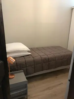 Un ou plusieurs lits dans un hébergement de l'établissement APPARTEMENT BASTIA AU PIED DU VIEUX PORT