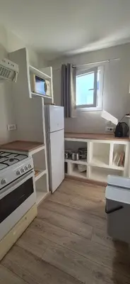Cuisine ou kitchenette dans l'établissement Gîte A l'ombre du clocher