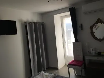 Télévision ou salle de divertissement dans l'établissement Casa di Emma