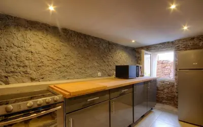 Cuisine ou kitchenette dans l'établissement La charmante **** Maison Cap Corse, Tomino