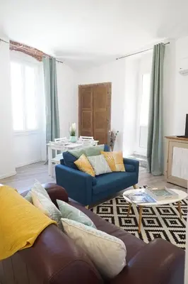 Coin salon dans l'établissement Appartement Gaudin
