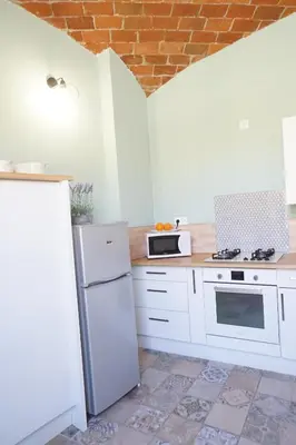 Cuisine ou kitchenette dans l'établissement Appartement Gaudin
