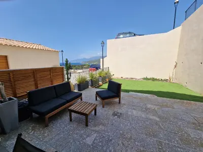 Coin salon dans l'établissement Domaine A Mortella T2