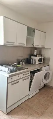 Cuisine ou kitchenette dans l'établissement maison de village T4