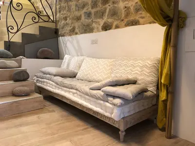 Coin salon dans l'établissement CORSE - Lumio, Balagne petite maison loft, vue imprenable sur le Golfe de Calvi