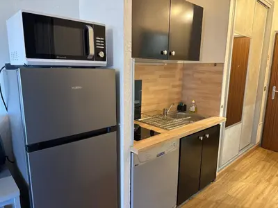 Cuisine ou kitchenette dans l'établissement Appartement n 216 Moriani plage
