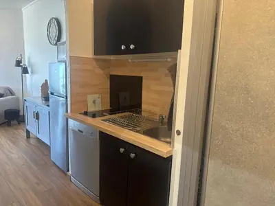Cuisine ou kitchenette dans l'établissement Appartement n 216 Moriani plage