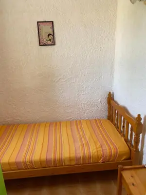 Un ou plusieurs lits dans un hébergement de l'établissement Location 5 personnes Sant Ambroggio Cocody village