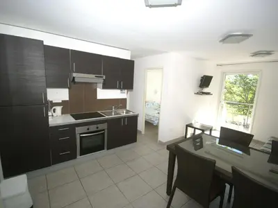 Cuisine ou kitchenette dans l'établissement Apartment in Moriani-Plage near the Beach