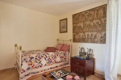 Un ou plusieurs lits dans un hébergement de l'établissement Casa La Colombaia
