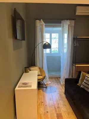 Télévision ou salle de divertissement dans l'établissement Les Terrasses de Padoue