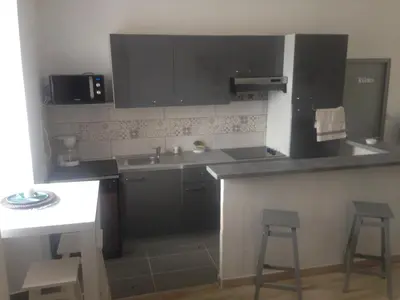 Cuisine ou kitchenette dans l'établissement Gîte Emma