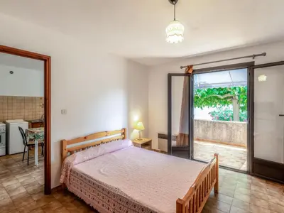 Un ou plusieurs lits dans un hébergement de l'établissement Apartment Dami II-1 by Interhome