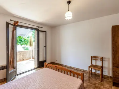 Un ou plusieurs lits dans un hébergement de l'établissement Apartment Dami II-1 by Interhome