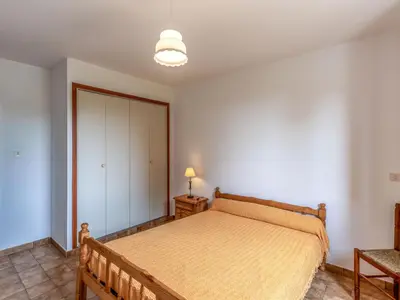 Un ou plusieurs lits dans un hébergement de l'établissement Apartment Dami II-2 by Interhome