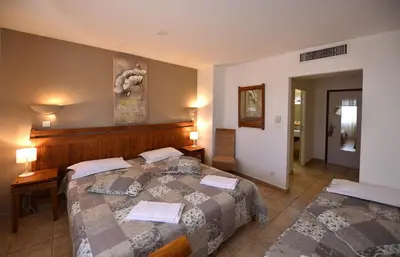 Un ou plusieurs lits dans un hébergement de l'établissement Hôtel A casa di Maria Cicilia