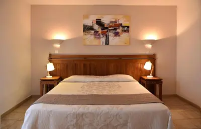 Un ou plusieurs lits dans un hébergement de l'établissement Hôtel A casa di Maria Cicilia