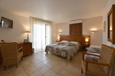 Un ou plusieurs lits dans un hébergement de l'établissement Hôtel A casa di Maria Cicilia