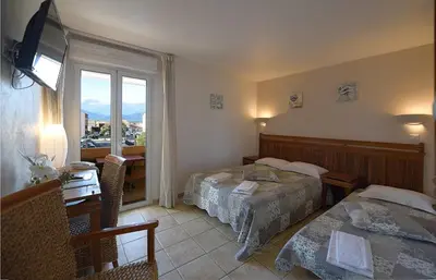 Un ou plusieurs lits dans un hébergement de l'établissement Hôtel A casa di Maria Cicilia