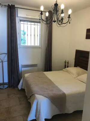 Un ou plusieurs lits dans un hébergement de l'établissement appartement climatise Classé 2 étoiles