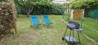 Jardin de l'établissement Mini villa au bord de la mer, proche Moriani (Corse)