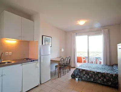 Cuisine ou kitchenette dans l'établissement Résidence Suarella