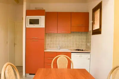 Cuisine ou kitchenette dans l'établissement Résidence Padro