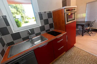 Cuisine ou kitchenette dans l'établissement Résidence Padro