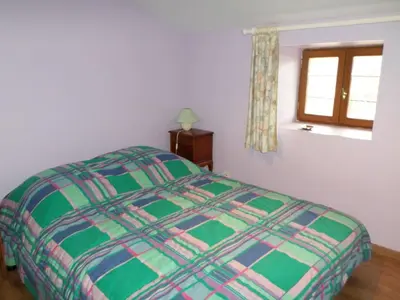 Un ou plusieurs lits dans un hébergement de l'établissement Maison de village