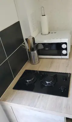 Cuisine ou kitchenette dans l'établissement Chambre d'hôte Kalango proche de la plage-Piscine
