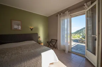 Un ou plusieurs lits dans un hébergement de l'établissement Auberge Lustincone