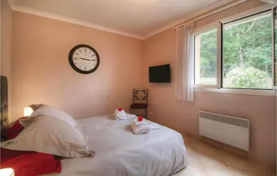 Un ou plusieurs lits dans un hébergement de l'établissement Cozy Home In Algajola With Wifi