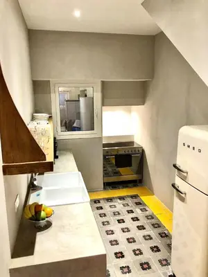 Cuisine ou kitchenette dans l'établissement VILLA CAMPANA - Bastia centre