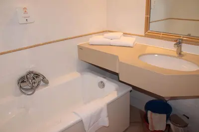 Salle de bains dans l'établissement Résidence Cala Bianca