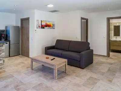 Coin salon dans l'établissement Holiday Home A Suara-2 by Interhome