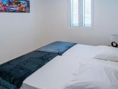 Un ou plusieurs lits dans un hébergement de l'établissement Holiday Home A Suara-2 by Interhome