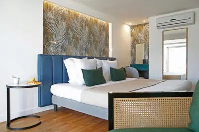 Un ou plusieurs lits dans un hébergement de l'établissement Hotel Balanea