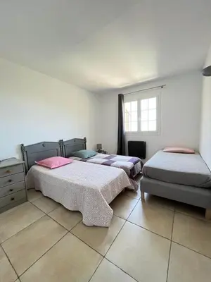 Un ou plusieurs lits dans un hébergement de l'établissement Maison 4 Pers - Vue mer et vignoble exceptionnelle