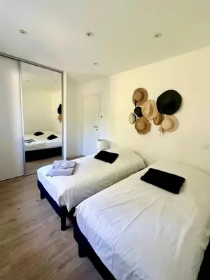 Un ou plusieurs lits dans un hébergement de l'établissement VILLA JUWEN